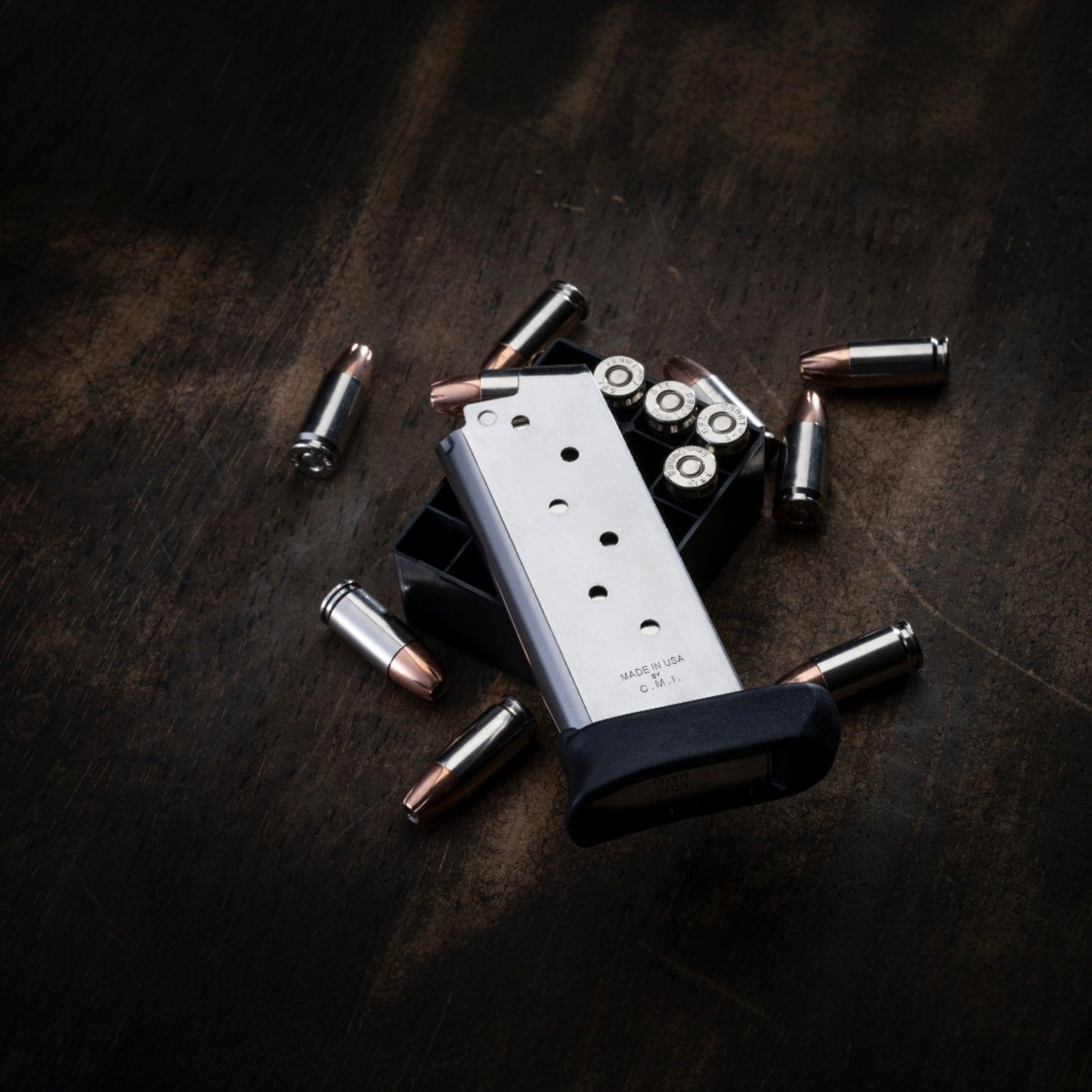 Check-Mate Mags Sig 938 and SA 911 magazine on a white background, showcasing firearm magazines for Sig Sauer pistols.